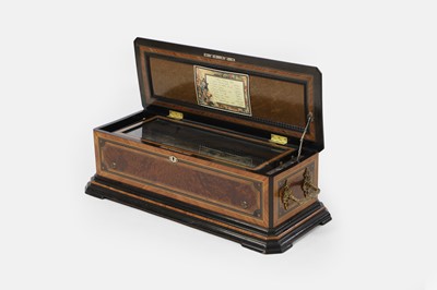 Lot 59 - A large amboyna and kingwood-cased musical box