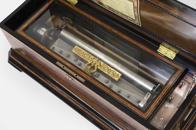 Lot 59 - A large amboyna and kingwood-cased musical box