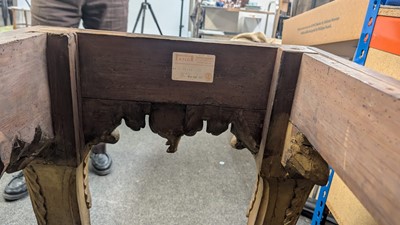 Lot 9 - A George II carved giltwood side table in the manner of William Kent