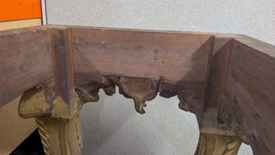 Lot 9 - A George II carved giltwood side table in the manner of William Kent