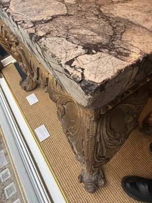 Lot 9 - A George II carved giltwood side table in the manner of William Kent
