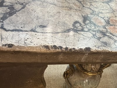 Lot 9 - A George II carved giltwood side table in the manner of William Kent