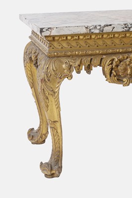 Lot 9 - A George II carved giltwood side table in the manner of William Kent