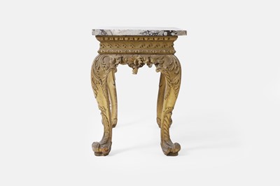 Lot 9 - A George II carved giltwood side table in the manner of William Kent
