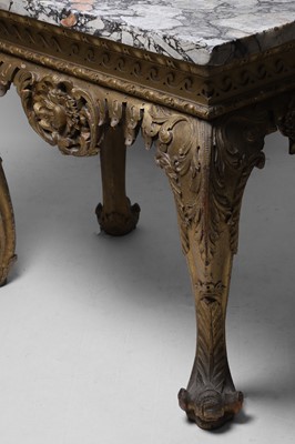Lot 9 - A George II carved giltwood side table in the manner of William Kent