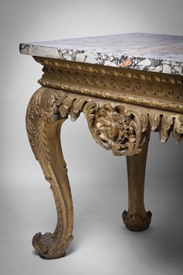 Lot 9 - A George II carved giltwood side table in the manner of William Kent