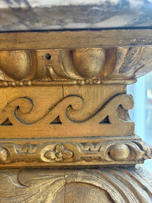 Lot 9 - A George II carved giltwood side table in the manner of William Kent