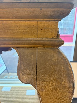 Lot 9 - A George II carved giltwood side table in the manner of William Kent