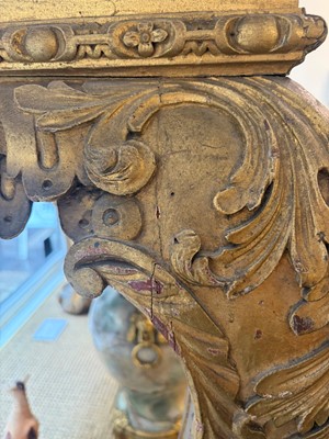 Lot 9 - A George II carved giltwood side table in the manner of William Kent