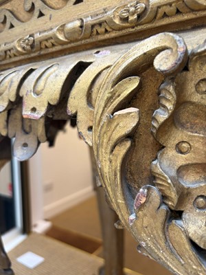 Lot 9 - A George II carved giltwood side table in the manner of William Kent