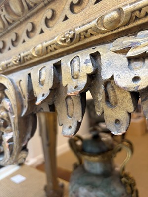 Lot 9 - A George II carved giltwood side table in the manner of William Kent