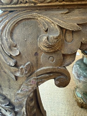 Lot 9 - A George II carved giltwood side table in the manner of William Kent