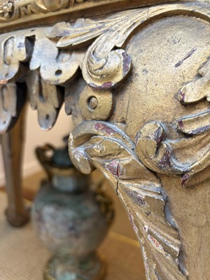 Lot 9 - A George II carved giltwood side table in the manner of William Kent
