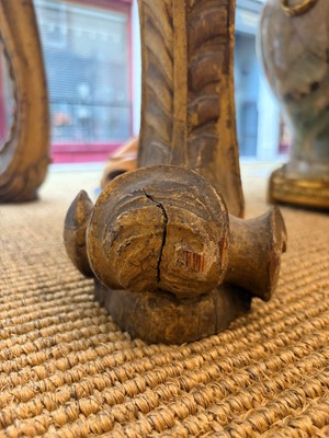 Lot 9 - A George II carved giltwood side table in the manner of William Kent