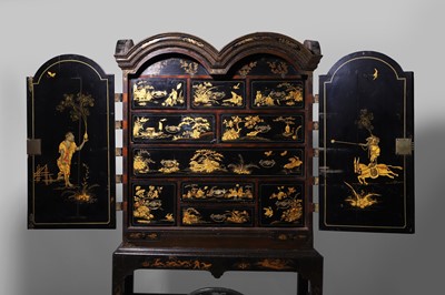 Lot 1 - A Queen Anne black-and-gilt japanned cabinet-on-stand