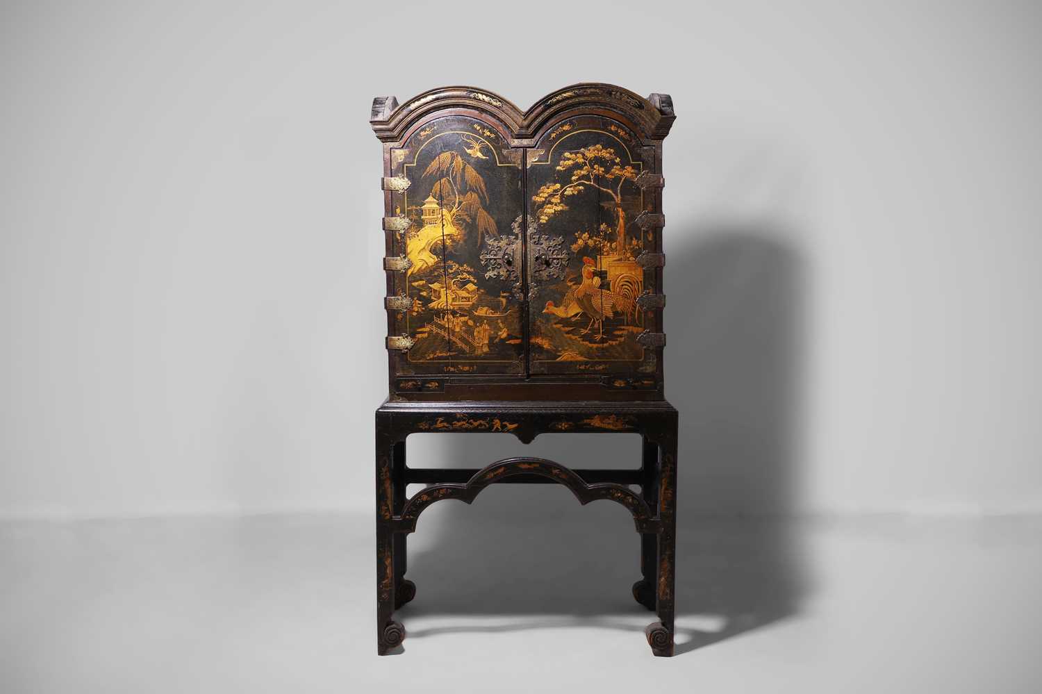 Lot 1 - A Queen Anne black-and-gilt japanned cabinet-on-stand