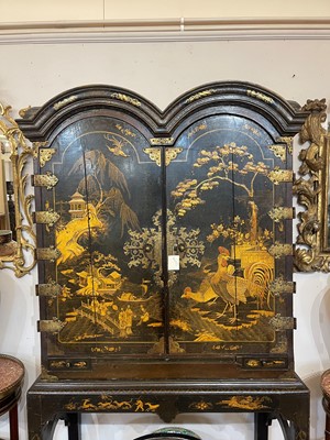 Lot 1 - A Queen Anne black-and-gilt japanned cabinet-on-stand