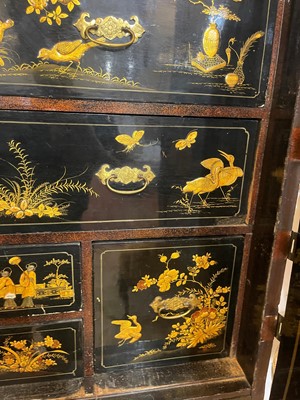 Lot 1 - A Queen Anne black-and-gilt japanned cabinet-on-stand