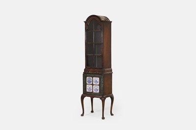 Lot 18 - A Queen Anne-style walnut cabinet