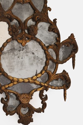 Lot 14 - A carved giltwood and carton pierre pier mirror
