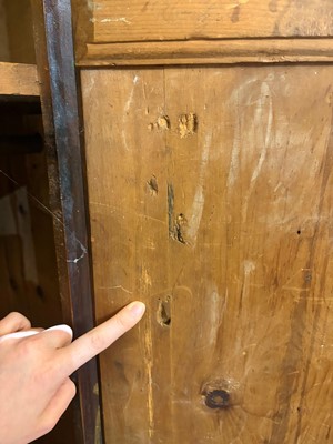 Lot 21 - A painted pine marriage cupboard