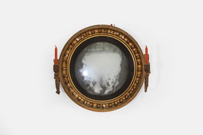 Lot 11 - A small Regency giltwood convex mirror