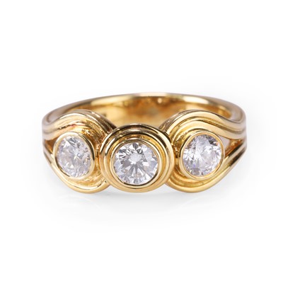 Lot 97 - An 18ct gold diamond three stone ring