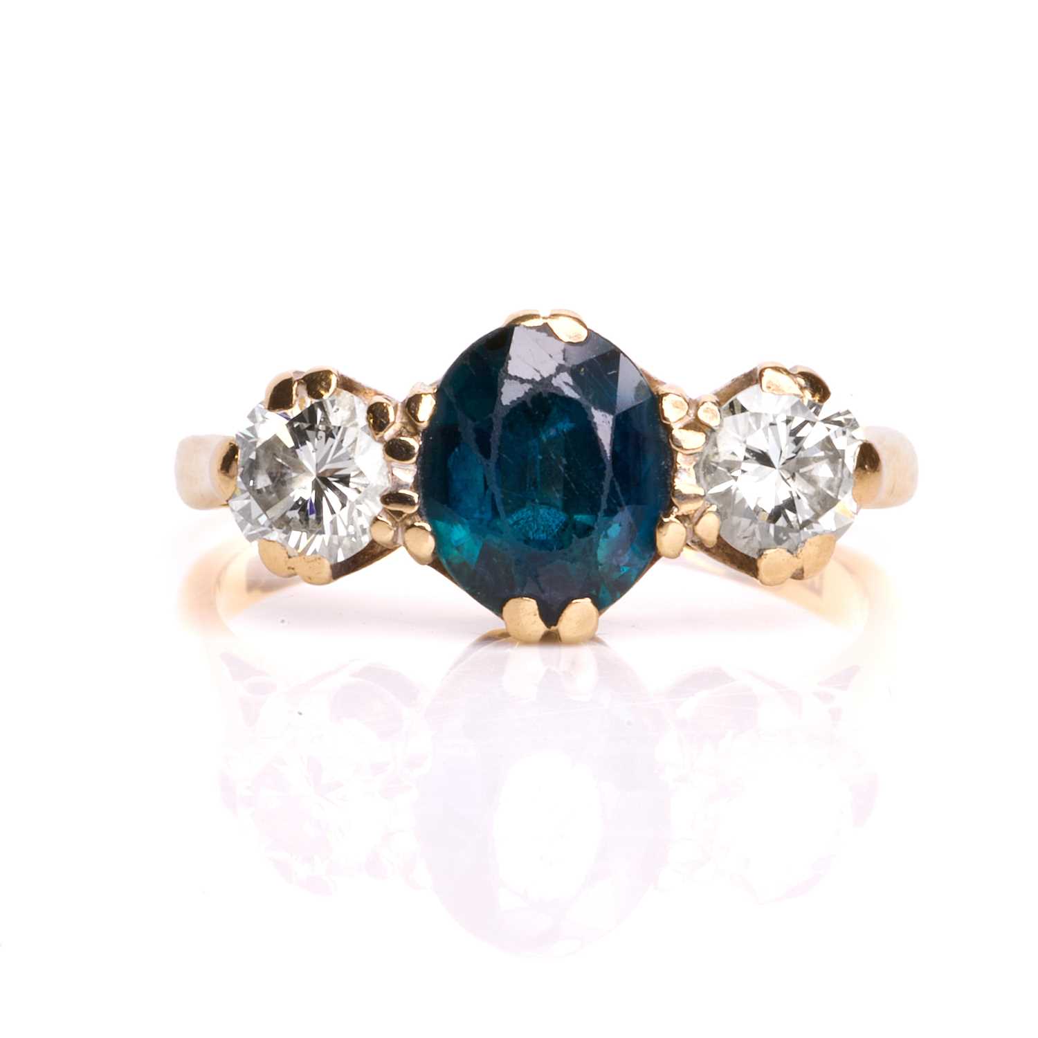 Lot 78 - An 18ct gold sapphire and diamond ring