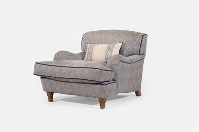 Lot 404 - An upholstered armchair in the Howard & Sons style