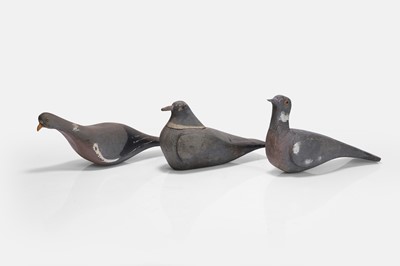 Lot 125 - A flight of three wooden decoy pigeons