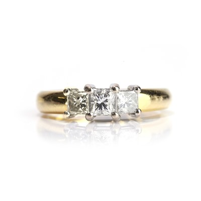 Lot 90 - An 18ct gold diamond three stone ring