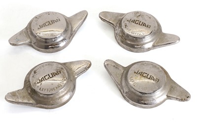 Lot 14 - A set of four matching Jaguar knock-off spinners