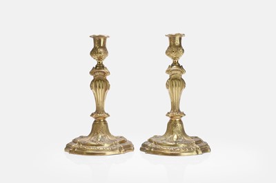 Lot 79 - A pair of Louis XV ormolu candlesticks