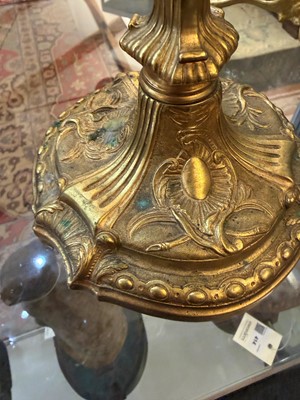 Lot 79 - A pair of Louis XV ormolu candlesticks