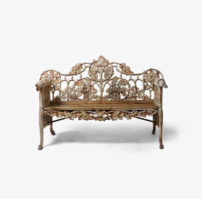 Lot 665 - A cast iron garden bench