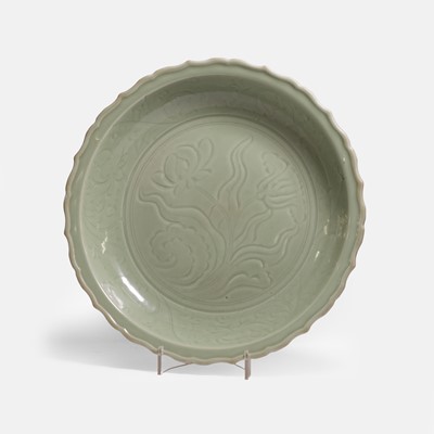 Lot 122 - A large Chinese celadon charger