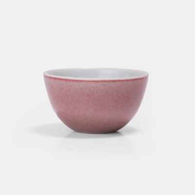 Lot 123 - A Chinese peachbloom-glazed teacup