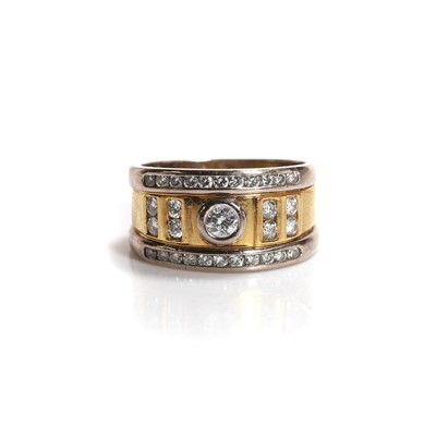 Lot 183 - A two-colour gold diamond set ring