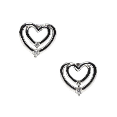 Lot 94 - A pair of 18ct gold diamond set stud earrings