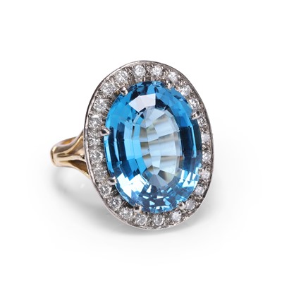 Lot 84 - A blue topaz and diamond cluster ring
