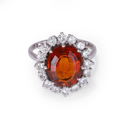 Lot 94 - A citrine and diamond cluster ring