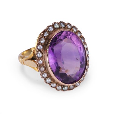 Lot 6 - An amethyst and split pearl cluster ring