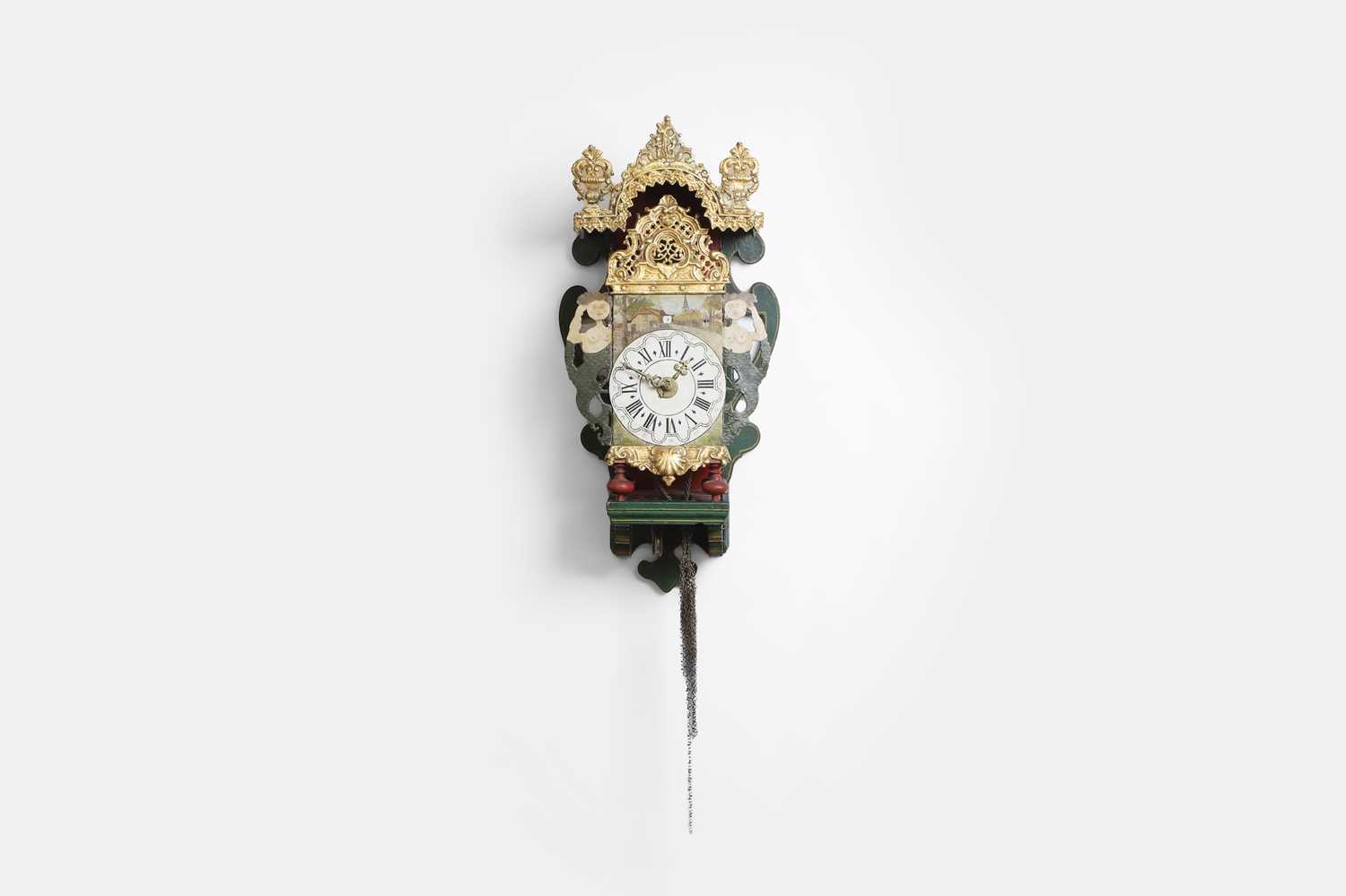 Lot 2 - A painted and parcel-gilt metal and wooden 'stoelklok'