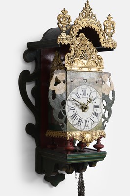 Lot 2 - A painted and parcel-gilt metal and wooden 'stoelklok'