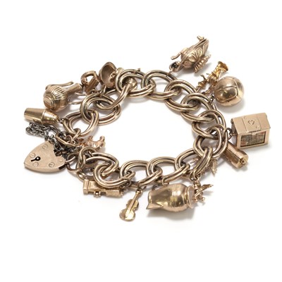 Lot 346 - A 9ct gold charm bracelet
