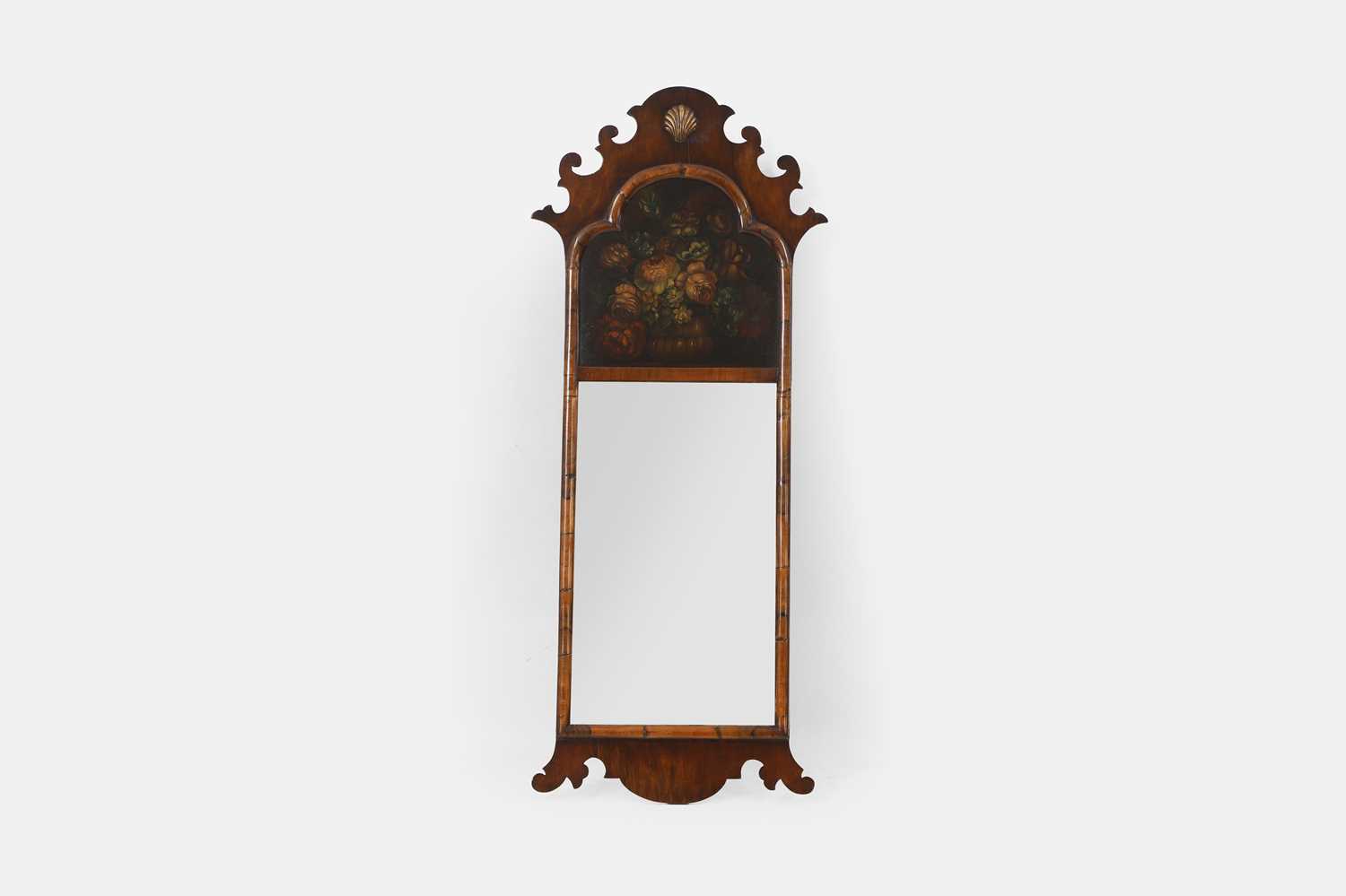 Lot 5 - A Queen Anne-style walnut pier mirror