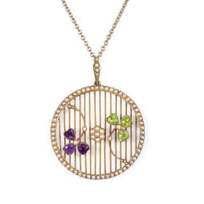 Lot 16 - An Edwardian amethyst, peridot and split pearl pendant on chain