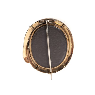 Lot 4 - An antique miniature portrait brooch