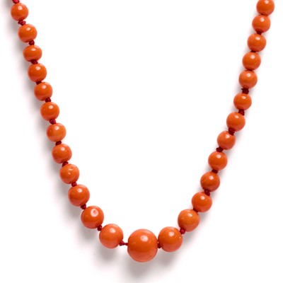 Lot 99 - A red coral bead necklace