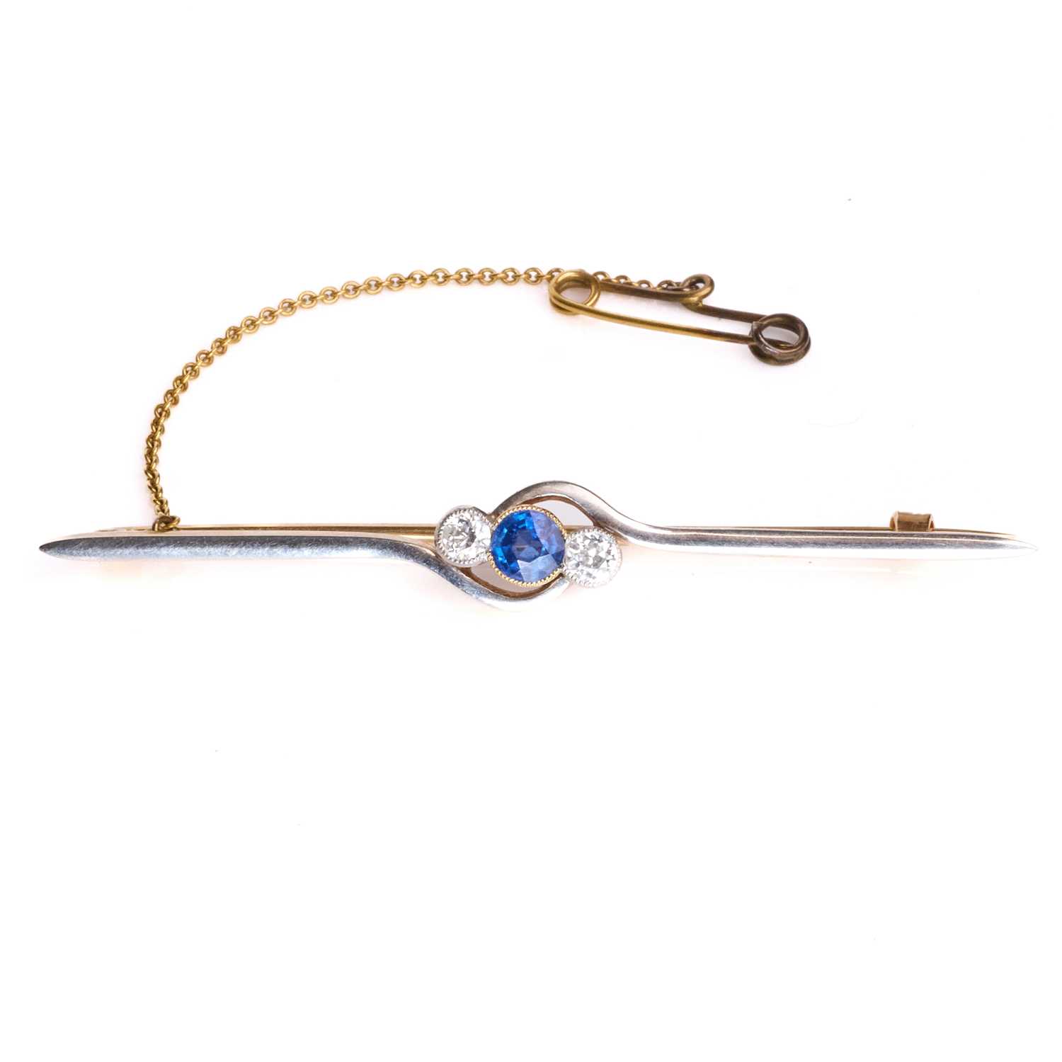 Lot 44 - A diamond and sapphire bar brooch